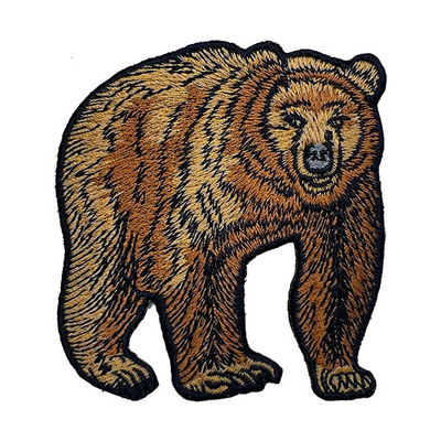 Braunbär-kundenspezifisches Stickerei-Flecken-Eisen auf der Stützung der gestickten Grenze für Jacken-Taschen